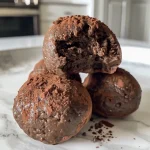 Close-up view of Healthy Chocolate Protein Bites arranged on a plate.