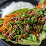 Close-up of Asian Style Ground Beef Lettuce Wraps with vibrant ingredients.