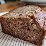 Close-up of a slice of Buckwheat Flour Banana Bread with a moist texture.
