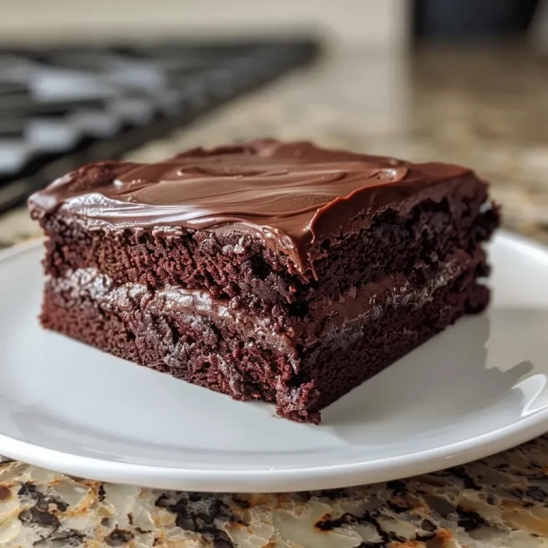 ['A moist, rich chocolate yogurt cake with a glossy surface and a side view showcasing its layers.', 'Close-up of a decadent chocolate yogurt cake, highlighting its soft texture and chocolatey color.', 'Side view of a slice of chocolate yogurt cake, revealing a fluffy interior and shiny top layer.', 'Detailed shot of a chocolate yogurt cake with a smooth glaze, emphasizing its creamy, inviting appearance.']
