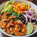 ['Close-up of a vibrant Grilled Shrimp Bowl featuring succulent shrimp and colorful toppings.', 'Side view of a delicious Grilled Shrimp Bowl with shrimp, avocado, and cilantro lime sauce.', 'Detailed view of a Grilled Shrimp Bowl showcasing juicy shrimp, black beans, and corn.', 'Close-up shot of a Grilled Shrimp Bowl with sliced avocado and lime wedges on the side.']